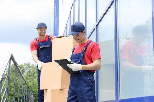 Efficient moving team carefully handling belongings