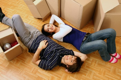 Satisfied customer receiving efficient furniture pick-up service in Kensington