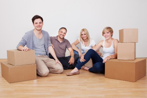 Local experts conducting a professional furniture pick-up evaluation in Kensington